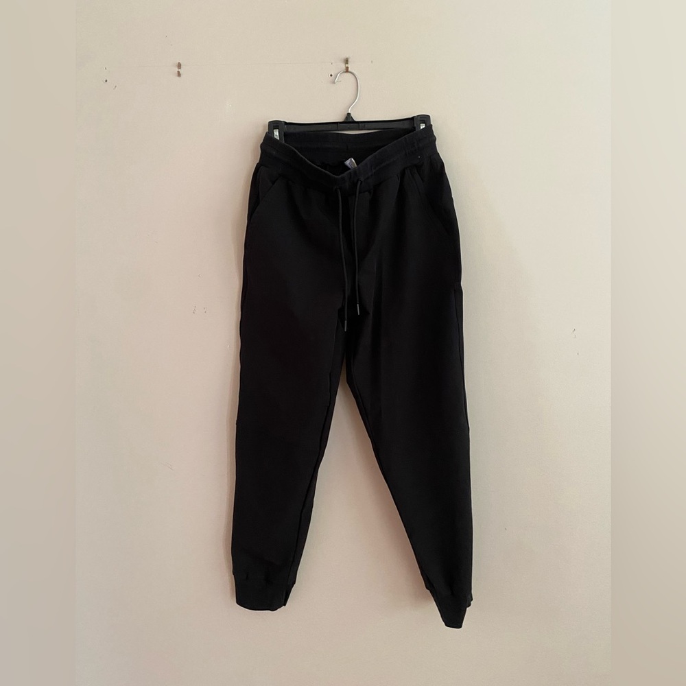 Black stretchtech parachute pants